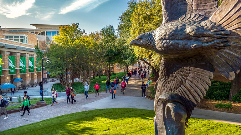 Eagle statue in front of students
