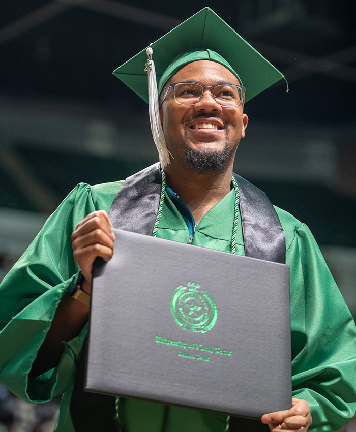 Student graduating at UNT. 